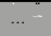 Combat for Atari 2600 - Three small planes chasing the large one...