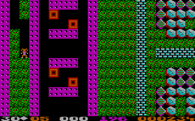 Boulder Dash II: Rockford's Revenge IBM PC/Compatibles Screenshot: Safe for the moment behind this wall, but eventually I need to deal with the boxes of doom...