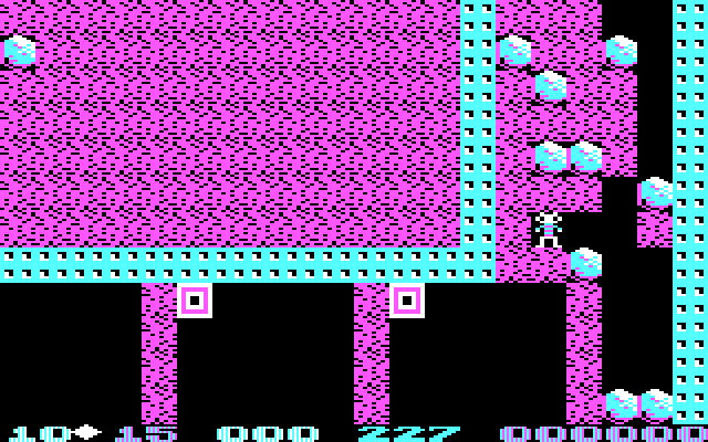 Boulder Dash II: Rockford's Revenge IBM PC/Compatibles Screenshot: Those boxes are deadly, but they can be crushed by boulders...