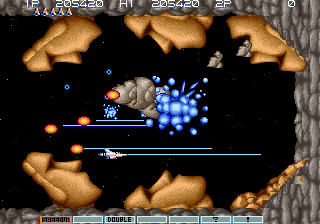 Gradius III Arcade Screenshot: Can you survive an assault from all directions?