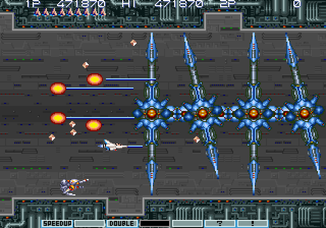 Gradius III Arcade Screenshot: This thing can't be destroyed, so you'll need to devise a strategy to sneak past it.