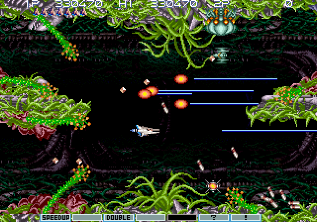 Gradius III Arcade Screenshot: Plants reach out for you and try to pull you into the walls.