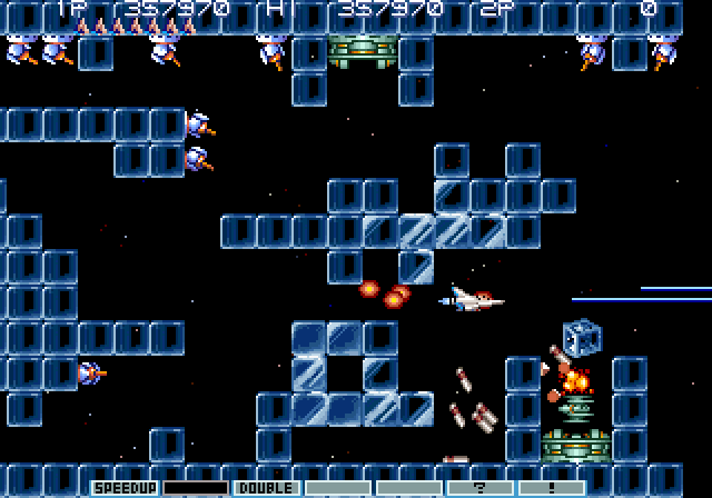Gradius III Arcade Screenshot: Blocks may suddenly appear here to block your path.
