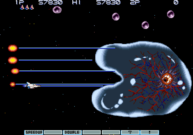 Gradius III Arcade Screenshot: Shoot the eye to destroy this thing!
