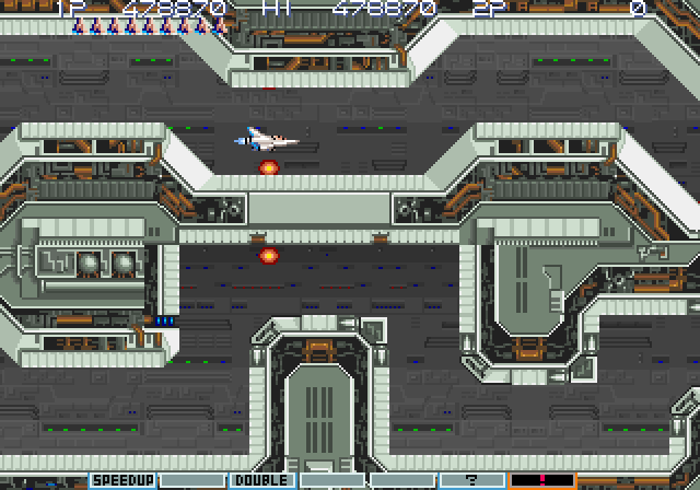Gradius III Arcade Screenshot: Time to escape! You'll need to think quick in this maze...