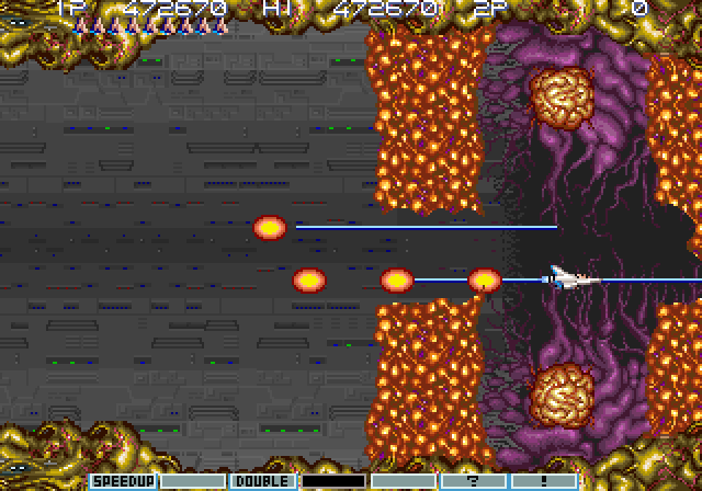 Gradius III Arcade Screenshot: These walls regenerate so you need to sneak past them quickly!