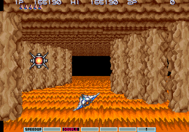 Gradius III Arcade Screenshot: This part of the game is 3D; there are no enemies and you can pick up bonus items, but don't crash into the walls.