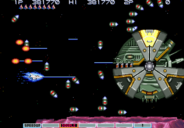 Gradius III Arcade Screenshot: Dodge all of these missiles!