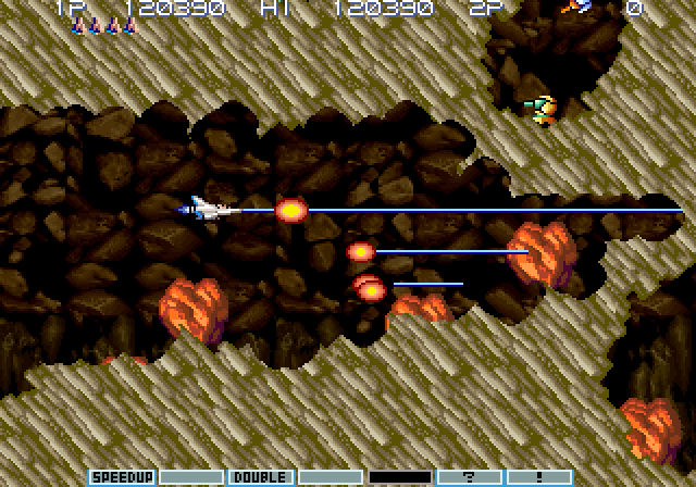 Gradius III Arcade Screenshot: You'll need to blast a path through the rocks!