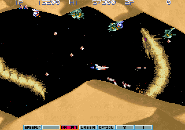 Gradius III Arcade Screenshot: Avoid or destroy the giant sand worms!