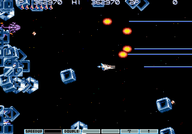 Gradius III Arcade Screenshot: Blocks are tossed your way extremely rapidly making them difficult to dodge.