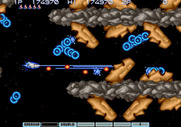 Gradius III for Arcade - This area scrolls vertically as well as horizontally.