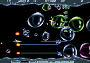 Gradius III for Arcade - When you shoot large bubbles they break up into smaller ones.