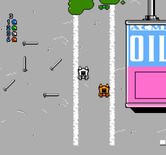 Micro Machines for NES / Famicom - A race in Oil Can Alley.