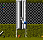 Micro Machines for NES / Famicom - A couple of rulers make a bridge from one desk to the next...