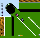 Micro Machines for NES / Famicom - Enter one of the pool table pockets and the Micro Machines appear at another one...