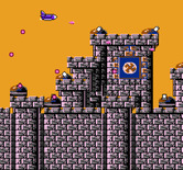 Double Strike for NES / Famicom - Destroy all of the gun turrets on this building.