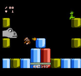 Big Nose Freaks Out for NES / Famicom - Another dinosaur! This opponent appears at each side of the screen...