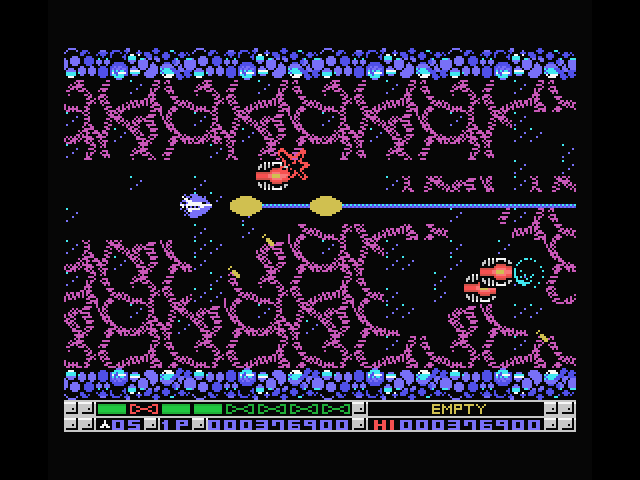 Nemesis 3: The Eve of Destruction MSX Screenshot: Shoot your way through this purple mesh...