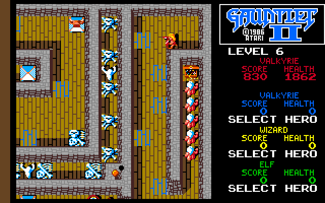 Gauntlet II Amiga Screenshot: Step on the flashing tiles to make walls disappear...