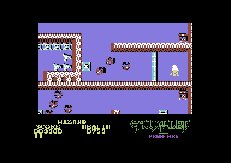 Gauntlet II Commodore 64 Screenshot: Starting a level trapped behind a door...