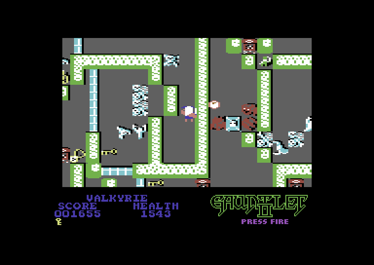 Gauntlet II Commodore 64 Screenshot: Watch out for rocks thrown over the walls by the lobbers.
