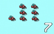 Stickybear Numbers for IBM PC/Compatibles - Trucks drive onto the screen.