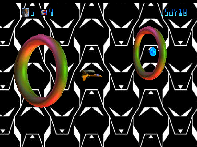 Trevor McFur in the Crescent Galaxy Atari Jaguar Screenshot: After defeating a boss you have an opportunity to power up; fly through rings, but don't crash into them!