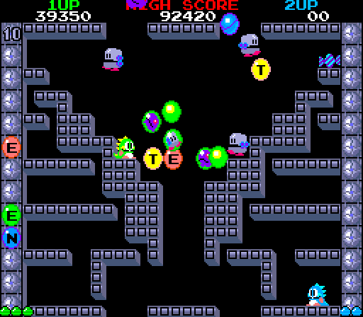 Bubble Bobble Arcade Screenshot: Collect letters for a bonus!