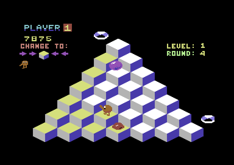 Q*bert Commodore 64 Screenshot: The purple ball hatches into the snake...