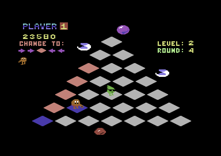 Q*bert Commodore 64 Screenshot: The green guy with glasses changes the cube colors on you.