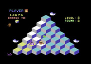Q*bert for Commodore 64 - Temporarily freeze enemies when you catch the green ball....