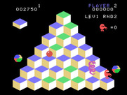 Q*bert for TI-99/4A - Use the discs to evade the snake.