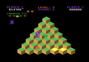 Q*bert for Atari 5200 - Catch the green ball to temporarily freeze opponents.