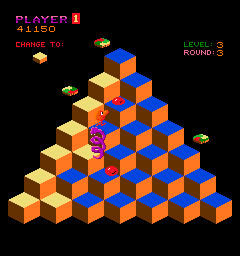 Q*bert Arcade Screenshot: Running from the snake...