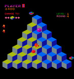 Q*bert for Arcade - The purple ball hatches into Coily the snake when it reaches the bottom of the pyramid.