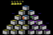 Q*bert for Atari 2600 - Catch the green ball to temporarily freeze opponents.