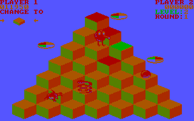 Q*bert IBM PC/Compatibles Screenshot: The enemies freeze and the screen flashes colors after you collect the green ball.