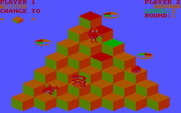 Q*bert for IBM PC/Compatibles - The enemies freeze and the screen flashes colors after you collect the green ball.