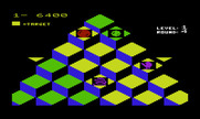 Q*bert for Commodore VIC-20 - Catch the green ball to temporarily freeze enemies.