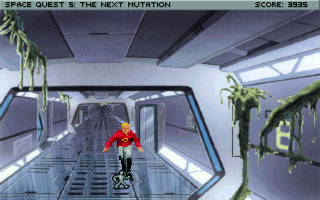 Space Quest V: The Next Mutation IBM PC/Compatibles Screenshot: Sneaking down a corridor.