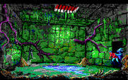 King's Quest V: Absence Makes the Heart Go Yonder! for IBM PC/Compatibles - A blue creature throws Graham into the dungeon...