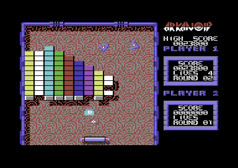 Arkanoid Commodore 64 Screenshot: The "D" capsule disperses the ball into three.