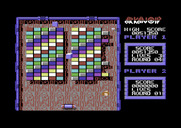 Arkanoid for Commodore 64 - Round four; collect the "S" capsule to slow the ball down.
