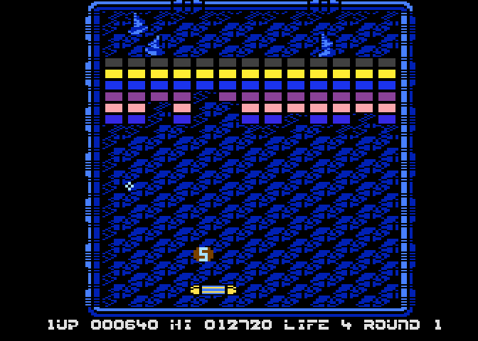 Arkanoid Atari 8-bit Screenshot: Catch the "S" capsule to slow down the ball...