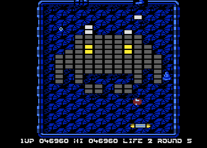 Arkanoid Atari 8-bit Screenshot: Catch the "L" capsule for lasers...