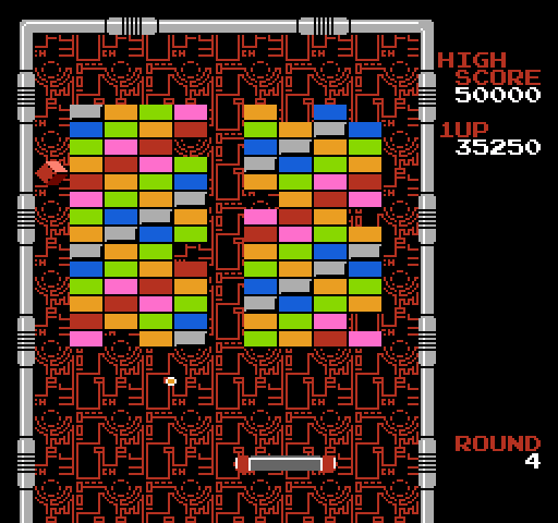 Arkanoid NES / Famicom Screenshot: The large paddle provides a little more surface area to deflect the ball.