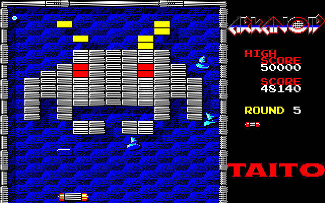 Arkanoid PC-8800 Series Screenshot: Catch the blue capsule to expand the size of the Vaus.