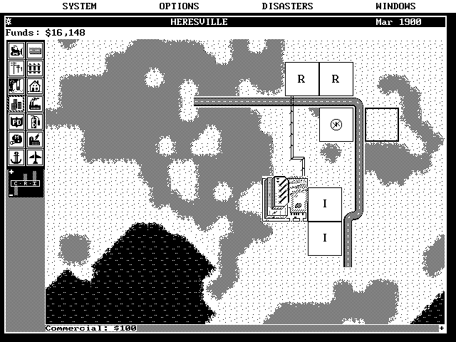 SimCity IBM PC/Compatibles Screenshot: Starting a new city; a few buildings and roads have already been placed.