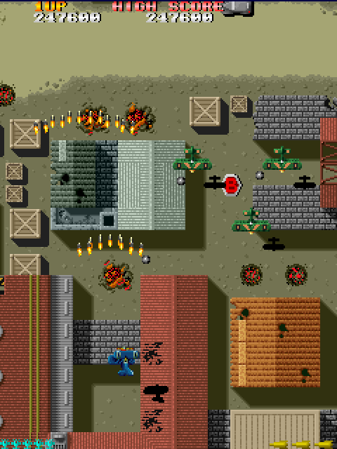 Sky Shark Arcade Screenshot: Collect the "B" power up to replenish your bomb supply.